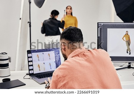 Laptop, photography editor and model in studio with photographer and shooting fashion design magazine cover or content. Creative, tech or startup people in collaboration, teamwork or makeup backstage