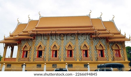 A beautiful church located in Wat Khok Bamrungraj. Ratchaburi Province, Thailand, and within the temple there is also a large Buddha image. and 3D wall pictures as well as beautiful