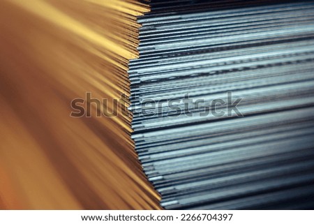 Sheets of metal in a stack in a warehouse Royalty-Free Stock Photo #2266704397
