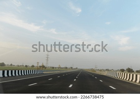 Delhi–Mumbai Expressway, Indian highways, traffic on Eastern Peripheral expressway, Kundli Manesar expressway, DelhiHaryana, India,  Royalty-Free Stock Photo #2266738475