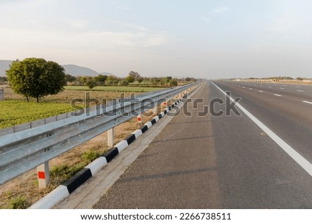 Delhi–Mumbai Expressway, Indian highways, traffic on Eastern Peripheral expressway, Kundli Manesar expressway, DelhiHaryana, India,  Royalty-Free Stock Photo #2266738511