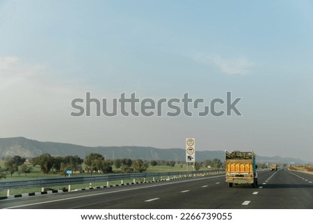 Delhi–Mumbai Expressway, Indian highways, traffic on Eastern Peripheral expressway, Kundli Manesar expressway, DelhiHaryana, India,  Royalty-Free Stock Photo #2266739055