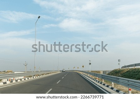 Delhi–Mumbai Expressway, Indian highways, traffic on Eastern Peripheral expressway, Kundli Manesar expressway, DelhiHaryana, India,  Royalty-Free Stock Photo #2266739771