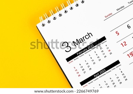 The March 2023 Monthly desk calendar for 2023 year on yellow background.