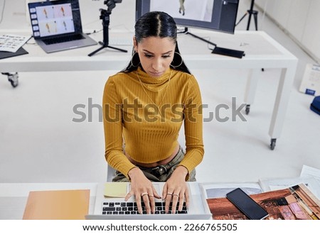 Photography editing, creative typing and woman working on web software for photo edit. Media, fashion photographer and photoshoot planning of a female studio employee doing computer work for press