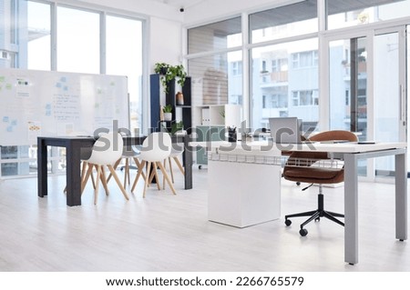 A space where creativity flows. Still life shot of a modern office space. Royalty-Free Stock Photo #2266765579