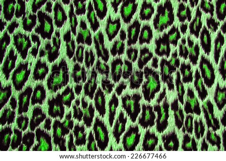 Green leopard, jaguar, lynx skin background