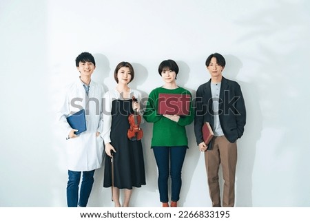 A group of college students from various departments. Faculty of Science, IT, literature, Music. Royalty-Free Stock Photo #2266833195