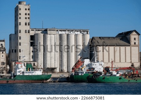 Disused and dilapidated silos near Haydarpaşa port and ships tied to the pier in front of them. İstanbul