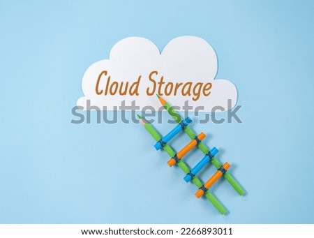 Cloud Storage Text Written on White Paper in the form of a Cloud on a Blue Background, Conceptual Photo.