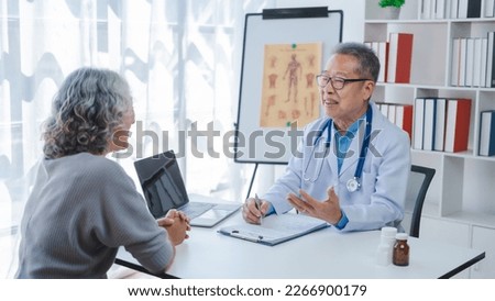 Elderly medical asian people with patient, Physical check-ups and encouragement for treatment of rheumatism and cancer The concept of health insurance for the elderly and health care