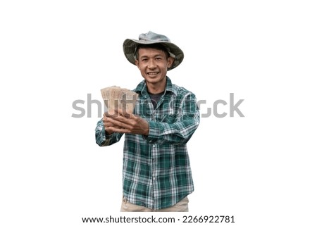 male farmer holding money from the sale agricultural products isolated from white background