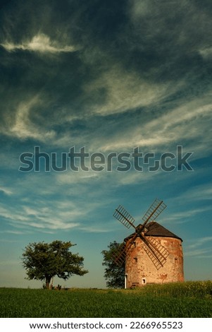 Windmill in the village of Kunkovice. A part of the Czech Republic called Slovácko. Spring landscape.