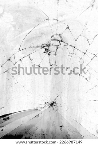 Texture of broken glass with cracks. Abstract cracked glass mirror