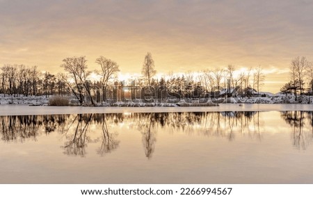 
winter landscape photo sunset water