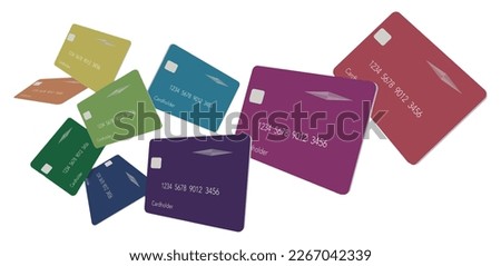 Nine credit card or debit cards in the colors of the spectrum float above a white background in this 3-D illustration. Royalty-Free Stock Photo #2267042339