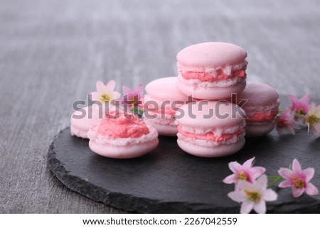 A macaron or French macaroon is a sweet meringue-based confection made with egg white, icing sugar, granulated sugar, almond meal, and food colouring.