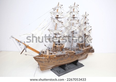 old sailing ship model with a white background