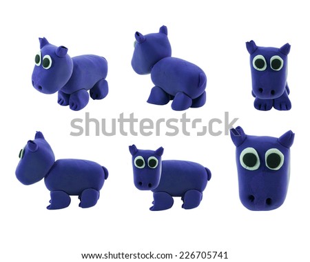set of cute purple hippopotamus made from plasticine