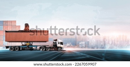 Container handler forklift loading at the docks to truck with stack of colorful containers box background and copy space, Cargo freight shipping import export logistics transportation industry concept Royalty-Free Stock Photo #2267059907