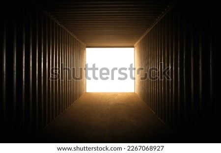 Empty Cargo Container with Light Rays. Square Dark Room Space Opening White Backdrop. Perspective Abstract Background	