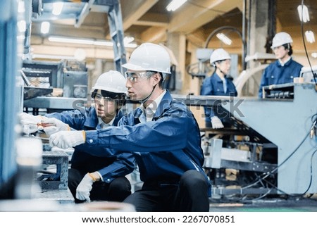 People working at the factory
