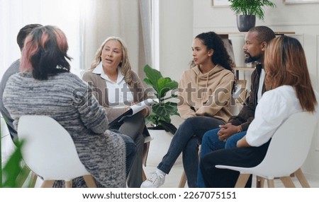 Counseling, group and psychology discussion with group of diversity people in therapy for depression, stress and anxiety. Men and women healing during psychologist meeting talking about mental health Royalty-Free Stock Photo #2267075151
