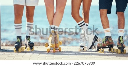 Roller skates, friends and beach with a group of people on the promenade at the beach with the sea in the background. Summer, fun and lifestyle with a skaters skating outside during a sunny day Royalty-Free Stock Photo #2267075939