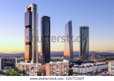 Madrid, Spain financial district skyline at dusk.