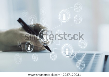 Social network media concept with hand writing in diary on background with laptop. Double exposure