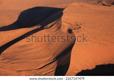 aerial view of red sand namib desert in sunset light