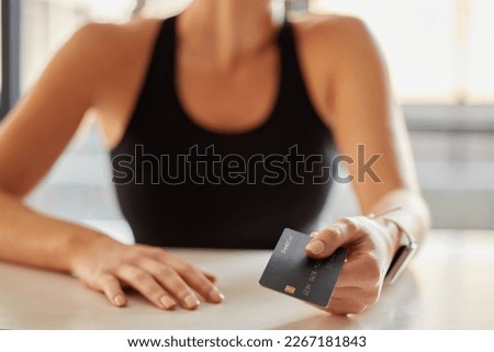 Hands, credit card and payment at gym for fitness membership or exercise subscription. Fintech, ecommerce and athlete or woman buying or paying for workout or training at exercising club for health. Royalty-Free Stock Photo #2267181843