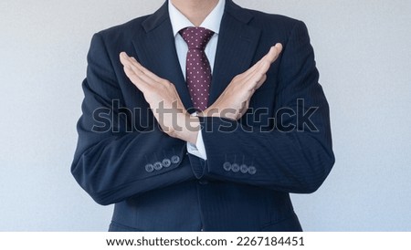 A man in a refusal pose. Royalty-Free Stock Photo #2267184451