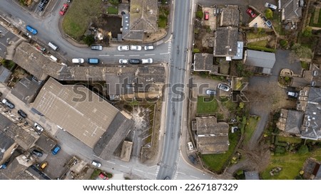 Aerial drone photo of the Village of Netherton near Huddersfield, in the Kirklees metropolitan borough of West Yorkshire, England showing the residential houses in the winter time