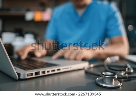 Close up of a stethoscope and digital tablet with virtual electronic medical record of patient on interface.Digital healthcare and network on modern virtual screen, medical technology.