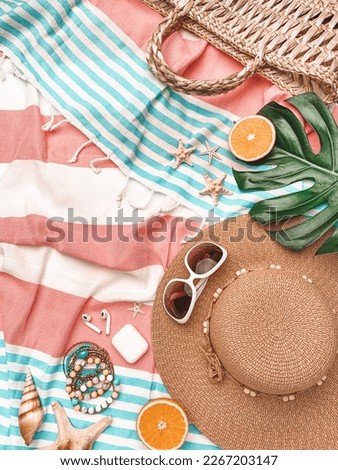 Summer flat lay photography. Summer accessories on towel background. Summer concept