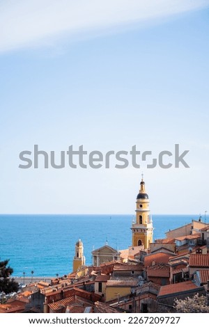 MENTON, FRANCE : Aerial view of the harbor and of the old town architecture.
