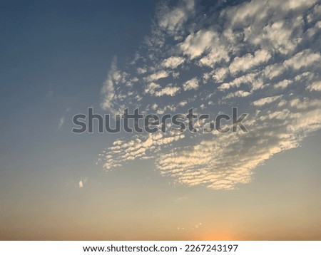 Altocumulus clouds are full of streaks of beautiful Imagination is like an eagle spreading its wings across the sky at Thailand.no focus