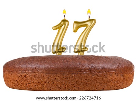 birthday cake with candles number 17 isolated on white background