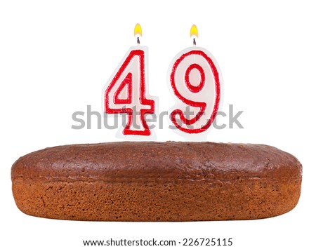 birthday cake with candles number 49 isolated on white background