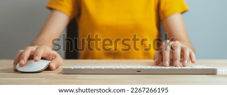 Woman hand typing and working on the keyboard.
