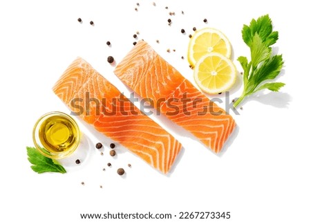 Fresh raw salmon fillet isolated on white background. Royalty-Free Stock Photo #2267273345