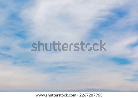 Summer cloudy dramatic rainy sky background. Panoramic view with beautiful clouds. Horizontal cloudscape. High-resolution photography. Design element. Copy space. 