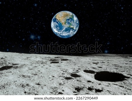 Planet Earth as seen from surface of The Moon.  Elements of this image furnished by NASA.