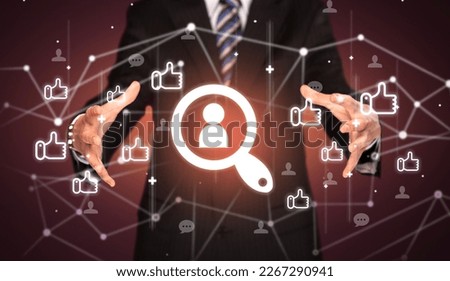 Hand holding social media icons