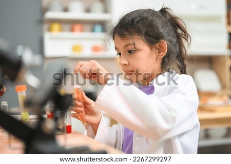 Back to school, Kids education knowledge, Child in classroom at school, Kid dressed Science lab coat. Science concept Royalty-Free Stock Photo #2267299297