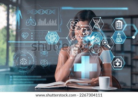 Smiling woman in casual wear taking notes in notebook at office workplace with coffee cup. Concept distant business education, information technology, dreaming, thinking. Health care medical drawings