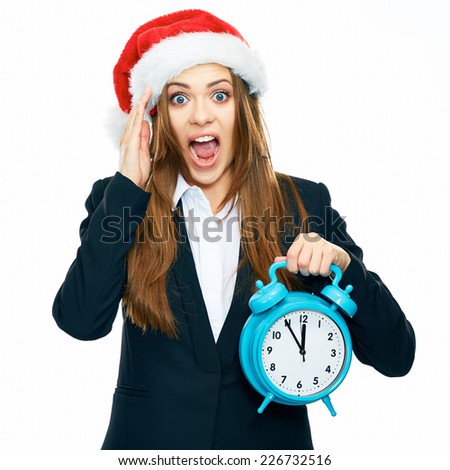 Surprising, shocked business woman hold big watch. Emotional portrait in Christmas style of young business woman isolated on white background.