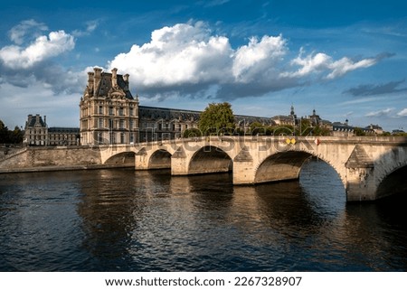 Bridge Pont Royal Over River Seine And Historic Buildings In Paris, France