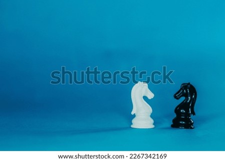 Chess. Chess set. Games and Recreation. Main and secondary pieces. Blue background. 